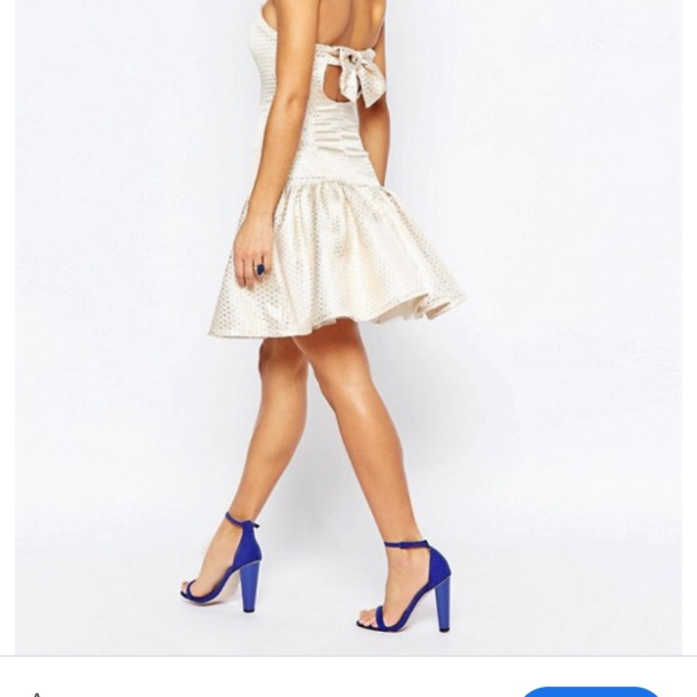 Drop waist gold brocade cocktail dress.